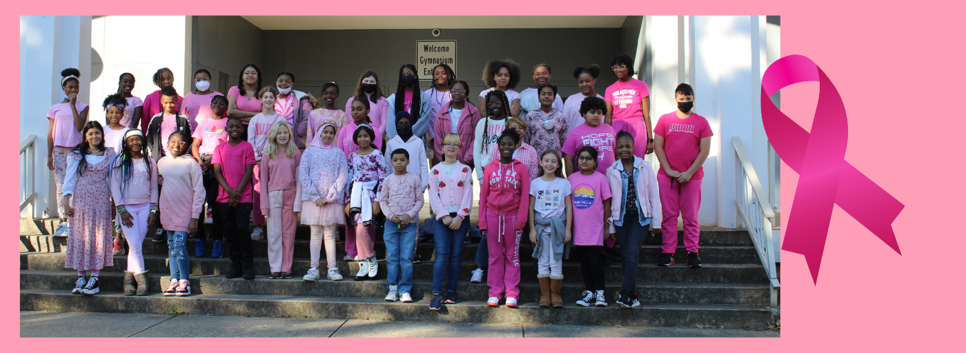 Group photo of students wearing pink for Breast Cancer Awareness