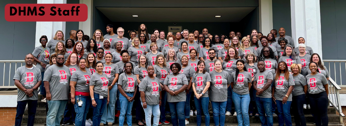 DHMS Staff photo on front steps of gym